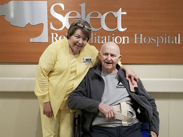 Bobby Carroll and his wife in the hospital lobby.