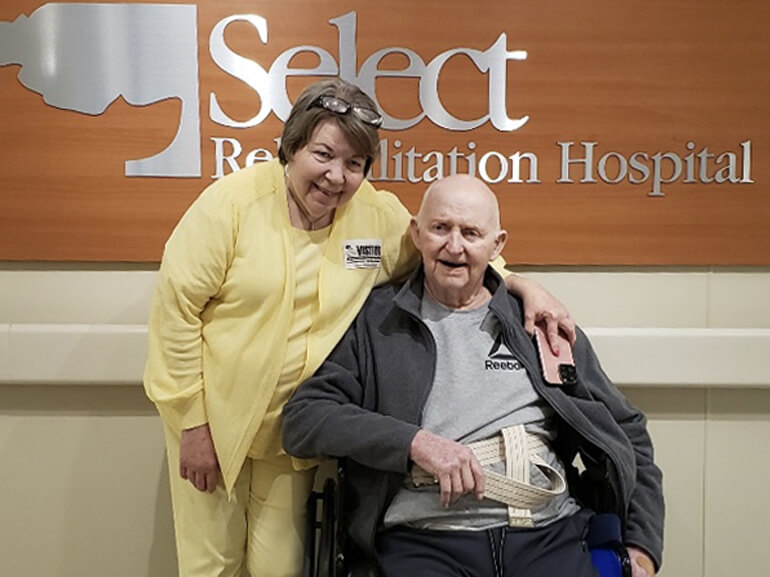 Bobby Carroll and his wife in the hospital lobby.