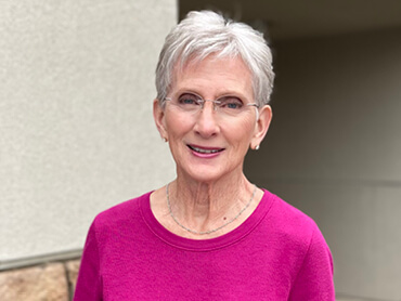 Kay Riley smiles after rehabilitation.